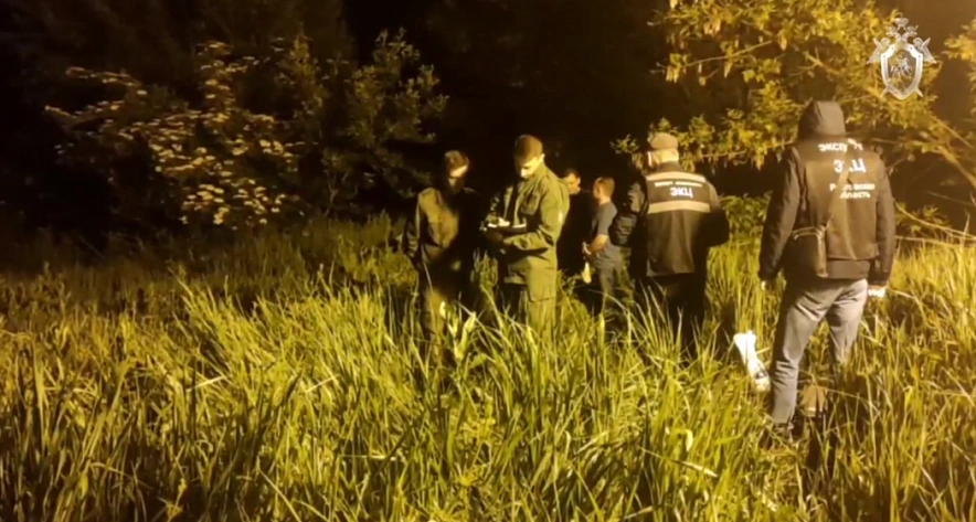 Фото: Следователи работают на месте убийства девочки в Ольгинской, кадр СКР