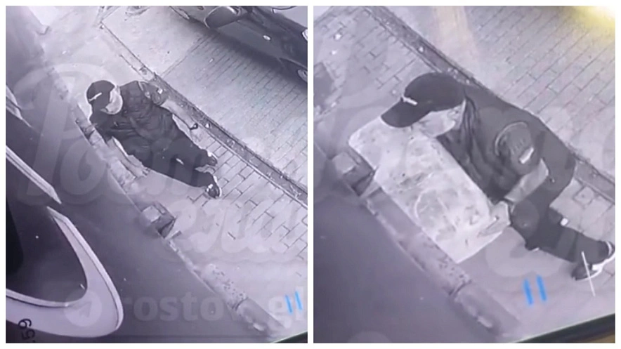 Фото: Момент нападения мужчины с бетонным блоком на салон красоты в Ростове, кадр ТГ Ростов Главный